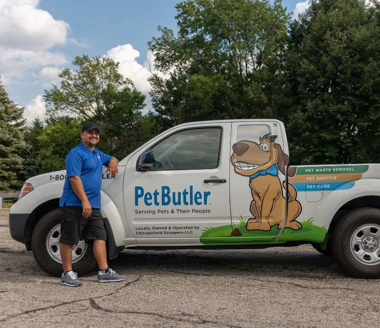 Jason Varas de Valdes, owner of Pet Butler of Walnut Creek, CA, standing next to a Pet Butler truck.