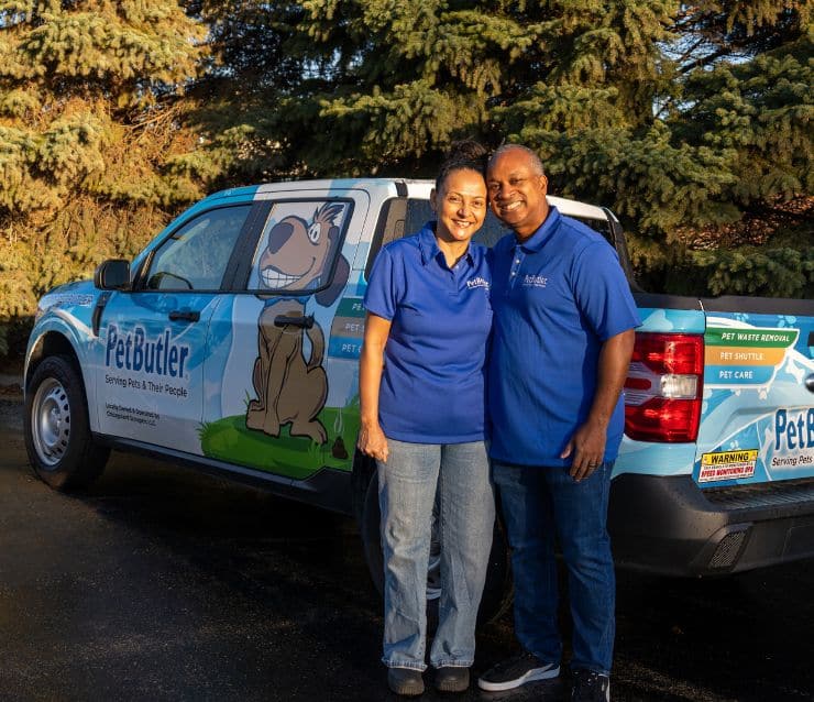 Pet Butler of Renton, WA Franchise owners in front of Pet Butler truck